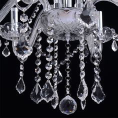 a crystal chandelier hanging from the ceiling