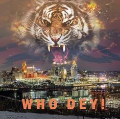 a tiger with it's mouth open in front of a cityscape and the words who dev