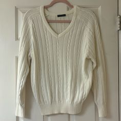 White V-Neck Cable Knit Sweater From Brandy. One Size Fits All. Nwot (New Without Tags). In Perfect Condition With No Stains Or Tears. Smoke Free Home. Please Feel Free To Ask Any Questions! I Am Open To All Offers. Brandy Melville Cable Knit Sweater, White Coquette Sweater, White Sweater Knit, Brandy Melville White Sweater, White V-neck Cable Knit Cardigan, Classic V-neck Textured Knit Sweater, Casual V-neck Ribbed Polo Sweater, White Ribbed V-neck Sweater, Cream Cotton V-neck Sweater