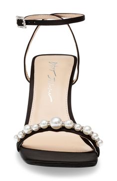 Pearly beads and dazzling embellishments lend timeless glamour to a luxe satin sandal fashioned with an angular square toe for contemporary appeal. 3 1/2" heel Adjustable ankle strap with buckle closure Cushioned footbed Synthetic upper, lining and sole Imported Pearl-embellished Open Toe Sandals For Evening, Pearl Embellished Open Toe Evening Sandals, Elegant Synthetic Sandals For Holidays, Pearl Embellished Open Toe Sandals For Evening, Elegant Holiday Sandals With Ankle Strap, Elegant Ankle Strap Sandals For Holiday, Elegant Sandals For Holiday Events, Timeless Glamour, Strap Sandals Women