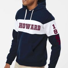 "Custom & Vintage Howard U HBCU College Apparel, Graphic Tees, Hoodies, Sweatshirts, and More Howard Univ Apparel For Both Howard Students and Howard Alumni. Black owned, HBCU alumni operated apparel company specializing in academic wear. This Howard U product is handmade in Atlanta, GA with materials purchased from local Atlanta vendors. We use only the best material, printing, and packaging. Orders typically ship much faster than posted timeframes.  Color Block Hoodie Specific Details/Specifications 8 oz./yd², 60/40 cotton/polyester sueded fleece Double-needle stitched throughout Three-piece jersey lined, contrast-color hood with sewn eyelets and contrast-color drawcord Contrast-color self-fabric panels on chest and arms Contrast twill tape at back of neck Side seams Set-in pouch pocket Collegiate Crew Neck Top With Drawstring Hood, College Crew Neck Top With Drawstring Hood, Crew Neck Top With Drawstring Hood For College, Collegiate Hoodie Tops For College, Collegiate Style Hoodie For College, White Hooded Top For College, Collegiate Hooded Tops For College, Navy Hooded Top With Letter Print, Navy Letter Print Hoodie Sweatshirt