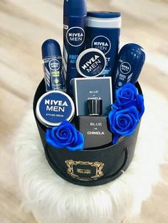 a dog is sitting in front of a basket with groom's products on it