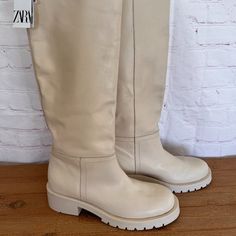 Nwt Zara Brand - Cream Color Leather Knee High Boots With Rubberized Lug Sole. Airfit. Technical Flexible Latex Foam Insole Designed To Offer Increased Comfort. Sole Height: 1.8 Inches (4.5 Cm) Size 40 Euro Us Size 9.5 White Leather Knee-high Boots Medium Width, Casual White Leather Knee-high Boots, White Leather Knee-high Boots With Round Toe, Beige Leather Knee-high Boots With Comfort Fit, Beige Leather Knee-high Boots Medium Width, Beige Leather Knee-high Boots For Spring, Cream Leather Knee-high Boots, Casual Cream Leather Heeled Boots, Spring Leather Knee-high Boots With Closed Toe