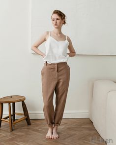 Introducing our Women's Linen Pants! Made for those easy-breezy days, these pants are a perfect blend of comfort and style. Crafted from lightweight linen fabric, they're ideal for everyday wear. MATERIAL: - High quality natural linen 100%  Listing INCLUDES: - 1 pc. Women's Linen pants  FEATURES: - Pockets - Cropped  - 100% Linen  - Stonewashed  - Soft  - OEKO TEX Certified  Model is wearing size S Color: Tobacco Model Measurements: Height: 5.7 ft. (175 cm) Bust: 35' (89 cm) Waist: 24.8' (63 cm) Summer Relaxed Jeans With Pockets, Effortless Summer Bottoms With Pockets, Effortless Relaxed Fit Summer Bottoms, Effortless Relaxed Fit High-waisted Pants, Everyday Relaxed Fit Straight Leg Pants, Everyday Tapered Straight Leg Bottoms, Relaxed Fit Jeans For Summer, Summer Straight Leg Pants With Effortless Style, Effortless Straight Leg Summer Pants