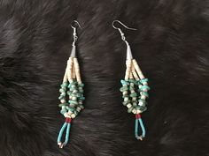 "Authentic Beautiful Native American Indian Jewelry Navajo Hand Beaded Long Dangle Jacla Earrings with Heishi Beads and Kingman Mine Turquoise. Great for a gift❤️ Handcrafted by Navajo Artist R. Sellers These beautiful earrings are 4.25\" in length Jacla is two loops of heishi that were originally earrings and sometimes fastened to the bottom of a stone necklace as a pendant-like attachment. Jacla is Navajo for \"ear string\"." Southwestern Adjustable Dangling Bead Earrings, Traditional Hand-strung Dangle Jewelry, Southwestern Teardrop Beaded Earrings, Southwestern Jewelry With Round Beads For Pierced Ears, Southwestern Style Drop Earrings, Adjustable Southwestern Beaded Earrings, Adjustable Hand-strung Southwestern Beaded Earrings, Indian Jewelry Earrings, American Indian Jewelry