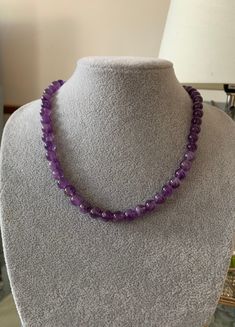 Amethyst Sterling Silver Necklace 18 ''. This is an Amethyst Sterling Silver beaded Necklace. The Amethyst Necklace has round shape beads with a Sterling Silver lobster clasp fastening. I can send this Amethyst Sterling Silver Necklace to you or to someone else anywhere in the world with your message. Dimensions  Necklace length 18 inches  Necklace width 8 mm An ideal gift for Birthday, Wedding bridesmaids gift, Graduation gift, Holiday jewellery, gift ideas , Anniversary gift and Mother's Day gift . I deliver to anywhere in the world. Contact  You can contact me anytime on my shop email with any questions, order and request. Purple Polished Beads Necklace For Gift, Purple Polished Beads Necklace As Gift, Purple Polished Beads Crystal Necklace As Gift, Gift Amethyst Necklaces With Round Beads, Round Beads Necklaces With Natural Stones For Anniversary, Single Strand Amethyst Necklace Gift, Purple Amethyst Round Bead Necklaces, Purple Amethyst Round Beads Necklace, Lavender Single Strand Necklace Gift