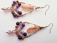 Teardrop Earrings With Dangling Beads, Handmade Amethyst Teardrop Crystal Earrings, Bohemian Gemstone Teardrop Earrings, Bohemian Teardrop Wire Wrapped Earrings, Purple Teardrop Chandelier Earrings As Gift, Handmade Purple Chandelier Earrings As Gift, Bohemian Gemstone Chandelier Drop Earrings, Bohemian Amethyst Chandelier Earrings Gift, Artisan Teardrop Chandelier Earrings As Gift