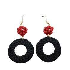 Black Rattan Dangle Earrings with Red Beads - Bold and Elegant! Enhance your style with our exquisite Black Rattan Dangle Earrings featuring Red Beads. These earrings combine the sophisticated allure of black rattan with the vibrant pop of red beads, creating a striking and unique accessory. Perfect for any occasion, these earrings add a touch of natural elegance and bold color to your ensemble, whether you're dressing up for a special event or enhancing your everyday look. Why You'll Love Our B Black Dangling Beads Jewelry For Beach, Black Beach Jewelry With Dangling Beads, Beach Jewelry With Black Dangling Beads, Handmade Red Hoop Earrings For Beach, Red Bohemian Hoop Earrings For Beach, Bohemian Red Hoop Earrings For Beach, Traditional Red Earrings With Black Beads, Black Dangle Jewelry For Beach, Black Beaded Earrings With Dangling Beads For Beach