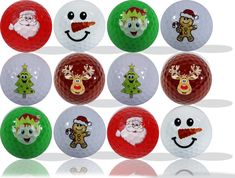 christmas golf balls with santa claus, snowman, reindeer, and other cartoon characters