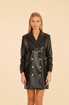 This season, mix it up with a nod to retro glamour in our Faux Leather Blazer Dress, a chic piece that channels the bold spirit of the ‘80s. This edgy blazer dress boasts a structured silhouette with a faux leather finish, perfect for making a statement while keeping warm this season. It features a double-breasted design with metallic buttons, and ruched sleeves for even more of a vintage flair. Faux leather Double-breasted Metallic buttons Ruched three-quarter sleeves Available in Black and Sca Chic Structured Blazer Dress For Party, Spring Party Blazer With Modern Style, Trendy Fitted Evening Blazer, Trendy Fitted Blazer For Evening, Modern Fitted Blazer Dress For Formal Occasions, Modern Spring Party Blazer, Chic Structured Party Blazer, Modern Fitted Single Breasted Blazer Dress, Modern Fitted Single-breasted Blazer Dress