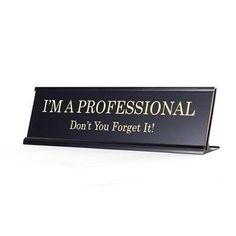 a sign that says, i'm a professional don't you forget it