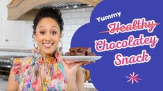 a woman holding a plate with some food on it and the words yummy healthy chocolatey snack