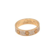 Cartier Love Wedding Band, Diamond Paved 18K Rose Gold ring set with 88 brilliant-cut diamonds totaling 0.31 carats Total Diamond Weight: 0.31ct Ring Size: US 6.75 (54 MM) Ref. CRB4085854 SKU: CAR01375 Please don't hesitate to contact us for any additional details. Cartier Diamond Ring With Pave Setting For Wedding, Cartier Diamond Promise Jewelry, Cartier Diamond Jewelry For Promise, Luxury Cartier Rose Gold Diamond Ring, Cartier Love Wedding Band, Wedding Band Diamond, Rose Gold Ring Set, Cartier Love Ring, Pave Diamond Ring