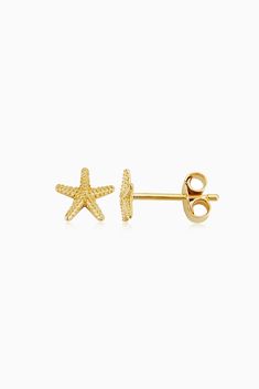 Designed with tropical vacations in mind, our Starfish Studs feature two intricately crafted solid gold starfish. Pair these earrings with other ocean-inspired jewelry, or let them shine solo. 14k Solid Yellow Gold Push Back Closure 0.5 Grams Solid Gold Crafted in Vicenza, Italy Yellow Gold Starfish Earrings With Starfish Charm, 14k Yellow Gold Starfish Jewelry, Yellow Gold Starfish Jewelry In Ocean-inspired Style, Yellow Gold Starfish Earrings For Gift, Yellow Gold Starfish Ocean-inspired Jewelry, Ocean-inspired Starfish Yellow Gold Jewelry, 14k Gold Starfish-shaped Jewelry, Elegant Yellow Gold Starfish Charm Earrings, Elegant Yellow Gold Earrings With Starfish Charm