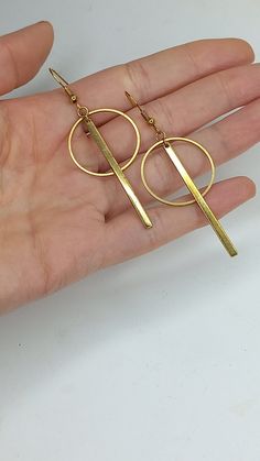 Boho Geometric brass Earrings 🌿 . This pair is made of hypoallergenic brass parts. No Nickel and no Lead. . Light to wear and easy to combine. 🌿 . . The item will arrive at you wrapped as a gift in a paper gift bag. . Here are some tips to ensure longevity with my pieces: 》 Avoid showering, swimming, and exercising with my pieces. 》 Avoid wearing perfumes with your jewelry. 》 Avoid sleeping with my pieces on. 》 When not in use, store items in a box. . 》SHIPPING: If you need a tracking number f Minimalist Gold Metal Plug Earrings, Modern Gold Plug Earrings As Gift, Modern Gold Plug Earrings For Gift, Modern Bronze Earrings As Gift, Gold Round Linear Earrings, Minimalist Brass Earrings For Gift, Bohemian Brass Linear Earrings For Gift, Minimalist Brass Earrings As Gift, Bronze Circle Brass Earrings