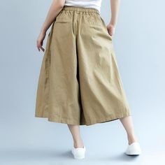 Item Type: PantsMaterial: CottonStyle: CasualSeason: Summer, springPattern Type: SolidWaist Type: NaturalPants Style: Wide Leg PantsFit Type: LoosePants Closure Type: Elastic One Size (Fit for EU 36,US6,UK8-10,AU8-10,NZ8-10)Length: 75.00 cm/29.52" Hip: 125.00 cm/49.21 " Waist:76.00cm-90.00cm/29.92-35.43" Thigh:78.00cm/30.71" PS： Please understand that the picture under the monitor may have a color difference. Spring Brown Bottoms With Pockets, Baggy High Waist Khaki Wide Leg Pants, Baggy High-waisted Khaki Harem Pants, Baggy High Waist Khaki Harem Pants, High Waist Baggy Khaki Harem Pants, Casual Wide-leg Summer Capris, Summer Casual Wide-leg Capris, Fall Season Beige Non-stretch Harem Pants, Brown High-waisted Harem Pants For Spring