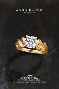 a diamond ring with the words gabril & co written on it in gold