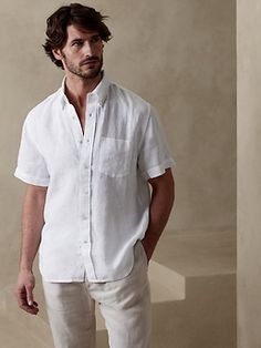 Luxurious, beautiful and naturally breathable, this linen shirt is crafted from 100% linen--a favorite for its ability to stay crisp and fresh even in heat and humidity.  UNTUCKED: Specially cut 1" shorter through the body for an untucked fit that st Neutral Family Photos, Mens Banana Republic, Boys Khaki Pants, White Party Outfit, Summer Family Photos, Short Sleeve Linen Shirt, Red Plaid Dress, White Linen Shirt, Beach Family Photos