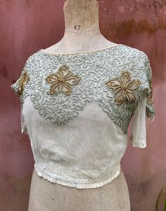 Exquisite 1900's Edwardian net lace embroidered blouse, an amazing early example.  Should fit a uk 6/8/ small 10 depending on what fit you want.   shown on size 8 mannequin. Measurements, waist 28 inches, length 15 inches, chest 34 inches can be worn the other way around so is easier to put on. Very good antique condition, no holes very wearable. Looks great with high waisted trousers. Net Lace, Lace Bodice, High Waisted Trousers, Embroidered Blouse, Dress Wedding, Top Dress, Blouse Top, Antique Vintage, Womens Clothing Tops