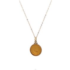 This stylish pendant necklace made from 14 karat yellow gold. The pendant has a cool coin design and hangs on a wheat chain. The detailed craftsmanship of the pendant makes it stand out and will add a unique touch to any outfit. The shiny gold finish gives it a classy look that's perfect for any occasion, whether you're dressing up or going casual. This necklace is a great choice for anyone who loves modern, elegant jewelry. Vintage Yellow Gold Tarnish Resistant Medallion Necklace, Yellow Gold Necklace With Oval Coin Pendant, Vintage Yellow Gold Tarnish-resistant Medallion Necklace, Classic Yellow Gold Coin Pendant Necklace, Vintage Yellow Gold Round Coin Necklace, Classic 14k Gold Coin Necklaces, Antique Necklace With Oval Coin Pendant, Antique Oval Coin Pendant Necklace, Antique Coin Pendant Necklace