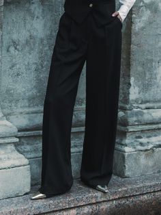 Flowing high-waisted palazzo trousers crafted from a textured suiting fabric and finished with delicate pleats at the front. Pair them with the matching waistcoat and oversize blazer to create a low-key three-piece suit.- loose fit- high waistline- pleats at the waist Elegant Wide Leg Semi-formal Suits, Elegant Full-length Wide Leg Pants For Work, Elegant Structured Pants For Formal Occasions, Elegant Wide Leg Office Suits, Elegant Structured Formal Pants, Elegant Wide Leg Suits For Semi-formal Occasions, Chic Wide-leg Formal Suits, Elegant Wide-leg Suits For Workwear, Elegant Wide Leg Suits For Office