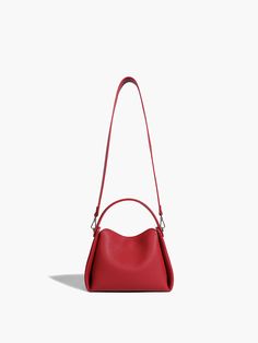 Details Composition: 100% Polyurethane Size & Fit Fit Type: Regular Fit Length: 24CM, Width: 10CM, Height: 19CM Cm Inch Size One Size One Size Care Instructions None Red Leather Bucket Bag For On-the-go, Versatile Red Bags For On-the-go, Trendy Red Top Handle Bucket Bag, Modern Red Crossbody Bag, Red Double Handle Bag With Mobile Phone Pocket, Red Double Handle Bag For Mobile Phone, Chic Red Bucket Bag With Top Carry Handle, Versatile Red Top Handle Bag, Trendy Red Box Bag With Double Handle