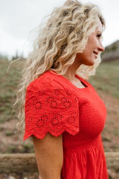 THIS SALE ITEM IS FINAL SALE Fashion-forward and feminine, the Zoey Top makes a statement. Boasting an eye-catching red hue and delicate eyelet detail on the scalloped short sleeve, this top will take any look from casual to chic. With a smocked bust and peplum top, this square neckline piece will have everyone asking where you got it! *Smocked bodice* Material Content: 100% Cotton Material Pattern: Eyelet detail Emily is 5'7 wearing a small Click here for denim Not sure what size? See our Sizin Spring Short Sleeve Tops With Scalloped Edges, Spring Tops With Scalloped Edges And Short Sleeves, Scalloped Edges Short Sleeve Tops For Spring, Red Flutter Sleeve Tops For Spring, Summer Tops With Scalloped Edges And Short Sleeves, Red Lace Trim Top For Summer, Red Lace Trim Tops For Spring, Red Lace Top For Summer, Bring Happiness