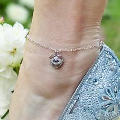 🔰 Searching for the perfect "something blue" for your special day❓ 🎨 Discover the exquisite Something Blue for Bride Evil Eye Protection Charm Anklet, a stunning accessory designed to complement your bridal gown and shoes. Featuring a sparkling cubic zirconia rhinestone and a charming blue evil eye heart, this anklet is not just a beautiful addition but also a symbol of protection and good fortune. The anklet is finished with a 5-inch silver heart extender, making it a perfect choice for a tou Something Blue For Bride, Evil Eye Anklet, Bridal Anklet, Symbole Protection, Charm Anklet, Heart Anklet, Silver Anklet, Silver Anklets, Blue Evil Eye