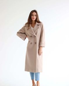 Description: A timeless wardrobe staple, this cashmere/wool coat exudes luxe sophistication. Pastel color and classic fit - perfect fresh addition to new season's wardrobe. Product Details: Outer Fabric: 64% Cashmere, 33% Wool, 3% Elastane Lined for comfort Dropped shoulder sleeve Please note: product color may slightly vary due to photographic lighting sources or your monitor settings. Each garment with natural fur will have slightly different color tone. Sleeve type length: 7/8. Full length op Luxury Winter Formal Sweater Coat, Classic Winter Sweater Coat With Lapel Collar, Elegant Spring Wool Coat In Solid Color, Elegant Solid Spring Wool Coat, Luxury Formal Winter Sweater Coat, Beige Wool Pea Coat For Office, Luxury Formal Sweater Coat For Fall, Formal Luxury Fall Sweater Coat, Luxury Formal Fall Sweater Coat