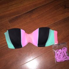 Brand New Victoria Secret Bandeau Swim Top With Tags! Size 32b. Colors Are: Aqua, Hot Pink, Light Purple, And Black Feel Free To Make Offers! Trendy Pink Strapless Tube Top, Trendy Strapless Tube Top For Poolside, Pink Bandeau Swimwear For Swimming, Pink Strapless Tube Top For Beach Season, Trendy Multicolor Bandeau Tube Top, Pink Beachwear Tube Top For Pool, Multicolor Strapless Swimwear, Pink Beachwear Tube Top For Beach Season, Pink Bandeau Swimwear For Beach Party