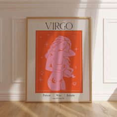 an orange and pink virgo poster hangs on the wall next to a wooden floor