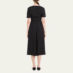 Prada dress in polka-dot print. Sweetheart neckline. Short sleeves. Ruched self-tie waist. Hem hits below the knees. A-line silhouette. Full front zip. Viscose. Made in Italy. Polka Dot Midi Dress For Daywear, Polka Dot Knee-length Midi Dress For Daywear, Sweetheart Midi Dress, Prada Dress, Ruched Midi Dress, Polka Dot Print, Dot Print, Sweetheart Neckline, Knee Length