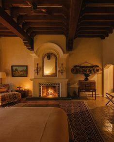 a living room with a fireplace and couches