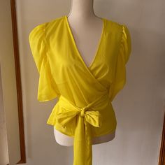 New York & Company V-Neck Wrap Tie Waist Top Ballon Sleeve V-Neck Waist Tie Nwt 100% Polyester *Color Of The Garment May Vary Due To Lighting * We Also Reuse All Boxes/Bags/Packaging For Shipping. Sold As Is. Smoke Free Home. Fast Shipping. Bundle & Save! Fitted V-neck Top For Summer Party, Fitted V-neck Top For Spring Party, Fitted V-neck Top For Spring Day Out, Yellow V-neck Top For Night Out, Summer V-neck Blouse For Night Out, Elegant Yellow V-neck Top, Chic Solid Color V-neck Top For Summer, Yellow V-neck Top For Party, Yellow V-neck Tops For Work