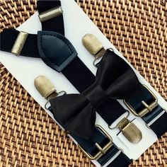 This black bow tie & black vegan leather suspenders set is a great choice for a boho wedding, groomsmen suspenders, bowtie, ring bearer outfit, bow ties for men, birthday celebration or any other special occasion. ❤ Our suspenders are extremely comfortable and form a Y-Back.  **Please Specify**  Bow Tie Only (w/ Clip or Neck Strap), Suspenders Only, or Bow Tie Only & Susp (Bow Tie and Suspenders) SUSPENDERS- One Pair of our Quality Suspenders BOW TIE - One Bow Tie on White Adjustable STRAP or Al Adjustable Black Bow Tie For Father's Day, Classic Suspenders For Suit And Tie At Party, Elegant Suspenders For Party Suit Accessories, Classic Black Belts And Suspenders For Party, Fitted Black Belts And Suspenders For Party, Classic Black Adjustable Suit And Tie Accessories, Bow Tie And Suspenders Set For Father's Day Party, Black Fitted Suit And Tie Accessories For Father's Day, Gold Adjustable Suit And Tie Accessories For Party