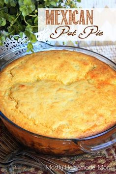 mexican pot pie in a glass dish on a table next to a green plant with the title above it