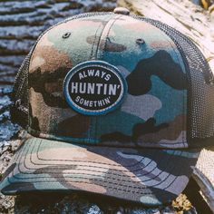 The hunt never end, it just starts all over again the next day. Get ready for the best time of the year, hunting season with our Always Huntin’ hat. Patch on our standard-low profile mesh hat in camo and black. Live Crazee stitched on the side of the mesh. Outdoor Camouflage Baseball Cap, Trucker Hat With Curved Brim For Hunting, Camouflage Snapback Baseball Cap For Outdoor Activities, Adjustable Trucker Hat For Hunting, Military Style Flat Brim Trucker Hat For Outdoor, Camouflage Hats With Curved Bill For Outdoor Activities, Camouflage Trucker Baseball Cap For Outdoor, Camouflage Hat With Curved Bill For Outdoor Activities, Outdoor Camouflage Trucker Baseball Cap