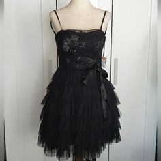 Brand:Deb Style: 390444 Rn# 136336 Y2k Early 2000's Size: 3/4 Juniors Color: Black Details: -Black Dress With Silver Floral Design With Black Sequin - Does Come With A Bow/Ribbon That Can Be Used.. - Zips Up On The Side Of The Dress - Front Does Have Some Padding - Strapless - Built In Slip Material: Self 100% Polyester Lining 100% Polyester Measures Appox.. Ptp: 13" Length: 26" Without Straps Brand New With Tags Still Attached Originally: $82.50 Marked Down: $49.99 2000 Dress Early 2000s, 2000s Hoco Dress, 2000s Formal Dresses, 2000 Dress, 2000s Dresses, Early 2000s Dresses, New Y2k, Deb Dresses, Y2k Dress