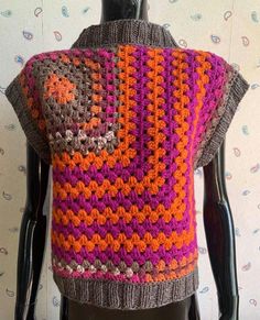 This vibrant unisex vest with  "granny square" and wave pattern in the pumpkin colors will keep you warm and will be appropriate at school and on autumn holidays, Halloween, Thanksgiving etc. Length - 48 cm (19 in) Width - 42 cm (16.5 in) Pumpkin Clothes, Pumpkin Outfit, Granny Square Pattern, Fall Vest, Pumpkin Colors, School Style, Granny Squares Pattern, Clothes Women, Vest Outfits