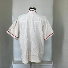 MADE IN MEXICO SELLING ONLY BY COLOR. We've received a large quantity of guayaberas imported from Mexico. The embroidery pattern might be different from the picture. But you will receive a genuinely unique, beautiful, detailed guayabera. For: Men Color: off-white Details: 100% Linen Classic Fit Short Sleeve Mandarin Collar 1 Front Pocket Machine Wash - please wash before wearing Washing Instructions: One thing to remember when washing a guayabera shirt is to wash it with similar colors and use c Luchador Mask, Guayabera Shirt, Linen Material, Remember When, Kids Boots, Embroidery Pattern, Boots For Sale, Online Sales, Mandarin Collar