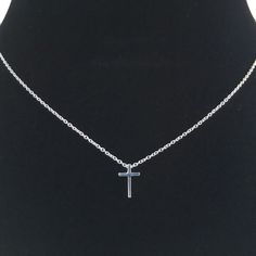 This tiny silver cross necklace is a classic addition to your layering necklaces. This minimalist necklace is also perfect by itself. The cross charm is sterling silver and measures approximately 12 mm in length or 1/2 inch. The chain is delicate looking but sturdy sterling silver. This dainty cross necklace is available in lengths from 15 - 18 inches. You may choose to add an attached extender. Your new necklace will come in a box, ready for gift giving. More Christian jewelry https://www.etsy. Sterling Silver Cross Necklace With Clavicle Chain, Simple Clavicle Chain Cross Jewelry, Simple Cross Clavicle Chain Jewelry, Silver Necklace With Delicate Chain And Cross Pendant, Minimalist Crucifix Necklace With Adjustable Chain, Minimalist Charm Necklace With Cross Pendant And Adjustable Chain, Minimalist Charm Necklace With Cross Pendant, Minimalist Cross Charm Necklace With Delicate Chain, Minimalist Clavicle Chain Necklace With Cross Pendant