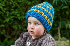 This is our beautiful bespoke, 100% wilderness wool Children's  Hat. No two hats are the same. So please do check out our full colour range! This exquisite wool is from the Falkland Islands where the sheep roam wild across undulating land. They are not dipped in chemicals nor do they suffer the painful method of mulesing. The wool is extremely soft & light. It is not itchy & non-static as it has zero acryllic properties in it. The label is made from cork which come's from the bark of a Cork Oak tree!  The whole item can be disposed off in the compost or recyling without any worry that you are contributing to plastics in the oceans!  It is a chunky wool knit and so is a thick hat, super for keeping your head cosy warm. It has extra length to ensure your ears can be covered when the wild win Wooly Hats, Falkland Islands, Childrens Hats, Chunky Wool, The Sheep, Leiden, Style Expert, Full Colour, Hand Spinning