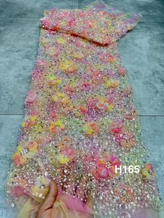 We offer a variety of fashion handmade fabric，those are widely use for wedding dress，garment and fashion cloth. we sell it by yard，our minimum order is 1 yards，and we always package it 15 yards for one roll，the width is about 125cm Material ： sequins ,mesh ，Rayon,polyester. Symmetrical embroidery floral pattern, with lovely flowers in the middle, scalloped border. You can also cut and use separately. Perfect for dress, tops, wedding veil.  You can split the piece up and have one scalloped edge a French Wedding Dress, Flower Lace Fabric, Scalloped Border, Wedding Dress Lace, Dress Tops, Embroidery Floral, French Wedding, Flower Lace, Handmade Fabric