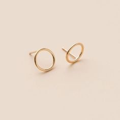 We couldn't miss adding the Circle to our family of geometric earrings. Everything comes full circle eventually. You can wear these circle of golden warmth solo or as a great addition to a second hole. Details:Location: EarlobeStyle: Minimalist/DaintyMade with: 14K Gold FilledBacks: Classic Butterfly The Circle, Full Circle, Geometric Earrings, Post Earrings, Gold Filled, Stud Earrings, Gold