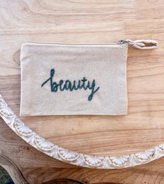 This beauty bag is perfect for you or a friend! Great for on-the-go travel size makeup! 5in.x4in. Travel Size Makeup, Embroidered Clutch, Embroidered Bag, Toiletry Storage, Beauty Bag, Travel Size, Cosmetic Bags, Travel Size Products, Cosmetic Bag