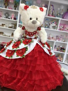 Purchase the Build-A-Bear upgrade by pressing on the link below https://www.etsy.com/listing/1048749321/build-a-bear-quinceanera-teddy-bear?ref=shop_home_active_6&frs=1 Make it extra special by purchasing the arch gift wrapping Looking for something extraordinary for that upcoming special occasion? This Quinceanera Teddy Bear is perfect for that special occasion as it will be personalized. It will be the perfect gift for the birthday girl. We can make this bear in many colors. Each bear will Teddy Bear With Red Dress Quince, 15 Teddy Bear, Red Mexican Quinceanera Theme, Quince Dresses Mexican Theme, Red Charro Quinceanera Theme Decorations, Bear For Quinceañera, Charo Quinceanera Theme, Red Charro Quince, Charro Quince Theme