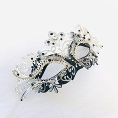 Masquerade mask in silver/black or Gold/Black base studded with rhinestone embellishing. S H I P P I N G - Processed same day or within 24 hours. 1-2 day guaranteed delivery services offered, add items to cart and click on shipping tab for rates. Pls leave a check out note with your need date & contact number (especially for expedited and custom orders) Msg for delivery time frames (Include your state/country). I N C L U D E D Mask comes with matching ribbons S I Z E Adult Size Mask. Detaile Elegant Halloween Masquerade Masks And Prosthetics, Elegant Evening Eye Mask, Carnival Evening Masquerade Eye Mask, Elegant Masquerade Mask For Mardi Gras, Elegant Masks For Carnival And Halloween, Elegant Masks For Mardi Gras Party, Elegant Mardi Gras Masquerade Eye Mask, Elegant Party Eye Mask, Elegant Eye Mask For Party