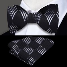 Distinguished Elegance: The Black and Light Silver Geometric Pattern Silk Bow Tie Indulge in the timeless sophistication of this silk bow tie, a fusion of suave black and refined light silver tones crafted into an exquisite geometric pattern. It's a statement piece that effortlessly encapsulates sophistication, offering a unique blend of versatility and distinguished style. Geometric Sophistication: Elegant Patterns The bow tie's geometric pattern, tastefully infused with light silver against a Formal Ties With Decorative Bow For Black-tie Events, Silver Ties For Black Tie Events, Elegant Bow With Butterfly Knot For Black-tie Events, Elegant Fitted Silver Suit And Tie Accessories, Elegant Formal Bow With Butterfly Knot, Black Standard Tie With Bow, Classic Bow Tie For Black Tie Events, Silver Suit And Tie Accessories For Black-tie Events, Classic Black Bow Suit And Tie Accessories