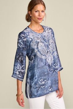 Embroidery, prints and florals... oh my! Yes, this tunic truly stuns with the level of detail. And not only is it pretty, but it's practical, too. The 3/4-length sleeves easily transition seasons, while the placket can be all buttoned up or you can leave a few unbuttoned with a tank underneath  how you wear it is up to you. Floral Print 3/4 Sleeve Kurta For Spring, Spring Floral Print Kurta With 3/4 Sleeves, Spring Embroidered Kurta With 3/4 Sleeves, Spring Kurta With Floral Embroidery And 3/4 Sleeves, Printed Spring Tunic Kurta, Spring Printed Tunic Kurta, Spring Long Sleeve Tunic With Printed Motifs, Spring Casual Tunic With Printed Motifs, Spring Printed Straight Kurta Tunic