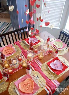 the table is set for valentine's day dinner